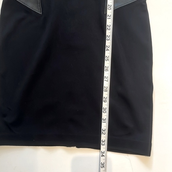 BEBE Black Sleeveless Mini Bodycon Dress with leather combo. - Picture 14 of 14